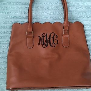Brown scalloped handbag